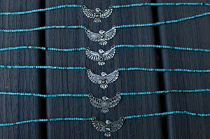 Thunderbird Sterling Silver Necklace with Turquoise Beads - A